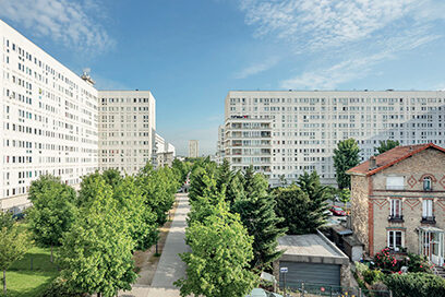 photo d'un quartier de la ville de Villeneuve-la-Garenne avec des immeubles et des arbres. - Agrandir l'image, fenêtre modale